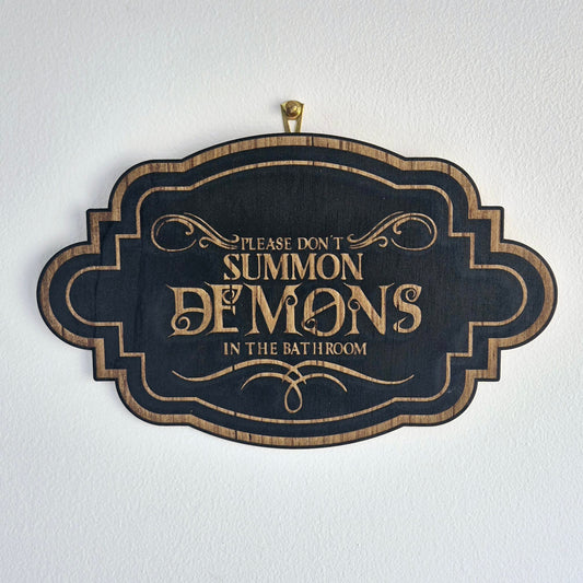 Demons Bathroom Sign